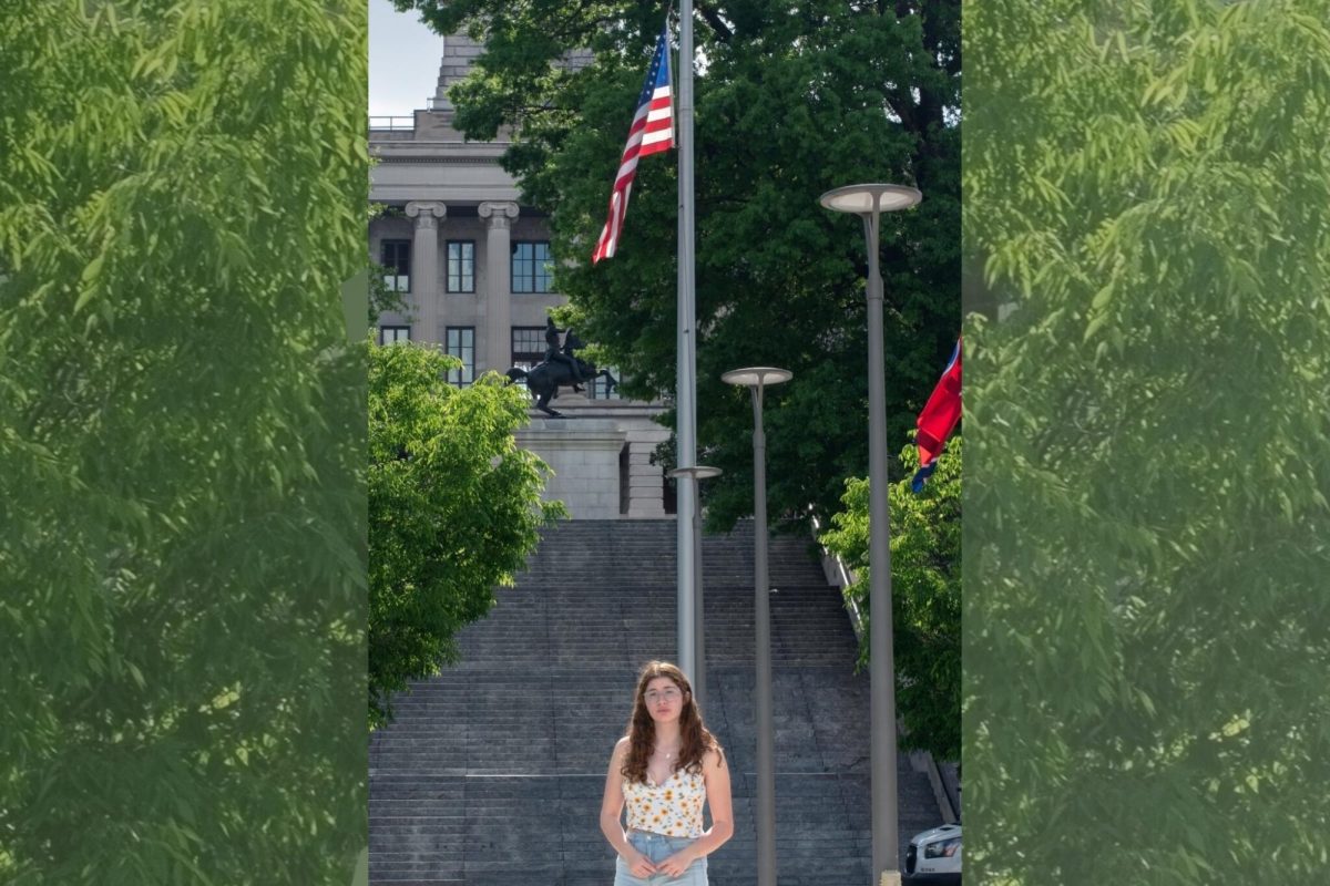 High school senior Emmie Wolf-Dubin stands outside the Tennessee Capitol Building. Photo by Laura Rodio.