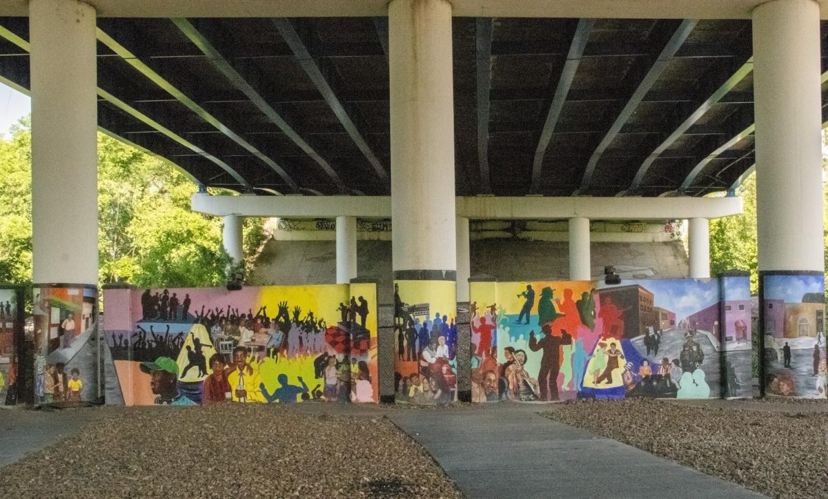 The mural depicting Jefferson Street's history sits below the I-40 overpass in North Nashville. Photo by Mac Miller.